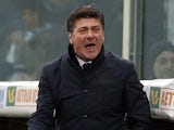 Napoli coach Walter Mazzarri react during the match against Fiorentina on January 20, 2013