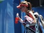 Agnieszka Radwanska leaves the court following her quarter-final defeat to Li Na on January 22, 2013