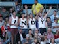 Supporters of Andy Murray celebrate after he takes the first set against Jeremy Chardy on January 23, 2013