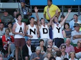 Supporters of Andy Murray celebrate after he takes the first set against Jeremy Chardy on January 23, 2013