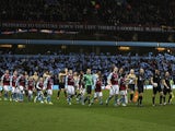 The Aston Villa and Bradford teams arrive on the pitch before their semi-final second leg on January 22, 2013