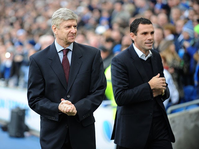 Arsenal manager Arsene Wenger and Brighton and Hove Albion's manager Gustavo Poyet before their sides match in the FA Cup fourth round on January 26, 2013