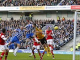 Brighton & Hove Albion's Ashley Barnes scores his side's first goal against Arsenal on January 26, 2013