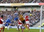 Brighton & Hove Albion's Ashley Barnes scores his side's first goal against Arsenal on January 26, 2013