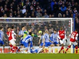 Arsenal's Theo Walcott scores his teams third goal in their FA Cup fourth round match on January 26, 2013