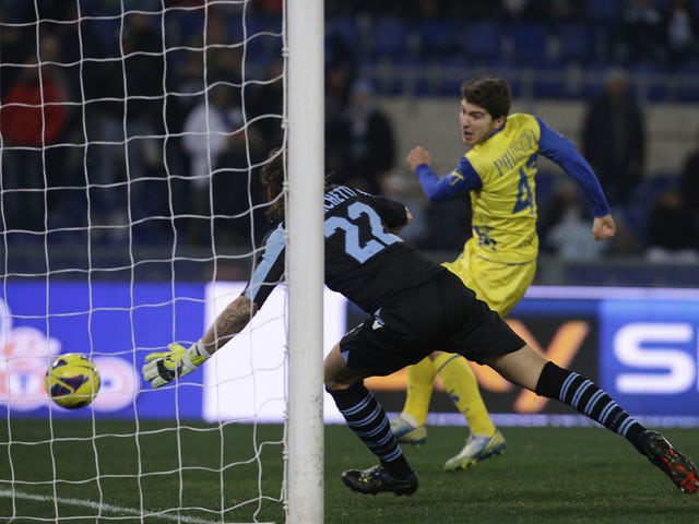Chievo player Alberto Paloschi scores during his sides match with Lazio on January 26, 2013