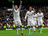 Cristiano Ronaldo celebrates with team mates after scoring in the match against Getafe on January 27, 2013