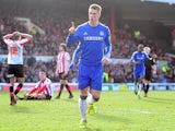 Fernando Torres celebrates scoring a late equaliser in the FA Cup fourth round tie against Brentford on January 27, 2013