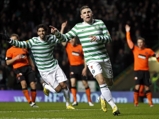 Celtic forward Gary Hooper celebrates a goal against Dundee United on January 22, 2013