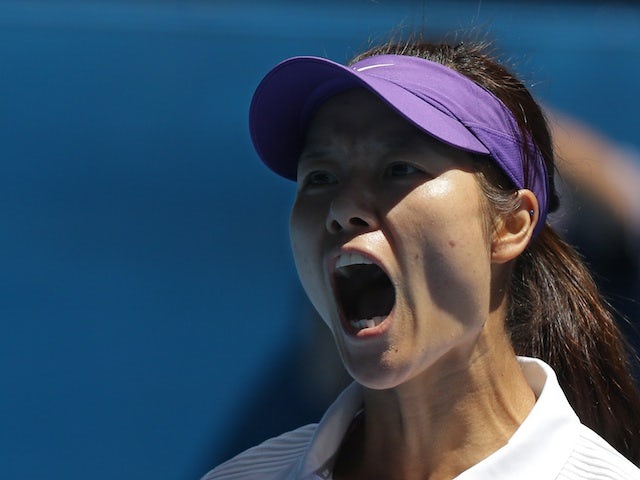 China's Li Na reacts during her quarter-final against Agnieszka Radwanska on January 22, 2013