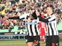 Udinese's Luis Muriel is congratulated by team mate Antonio Di Natale after scoring the opener against Siena on January 27, 2013