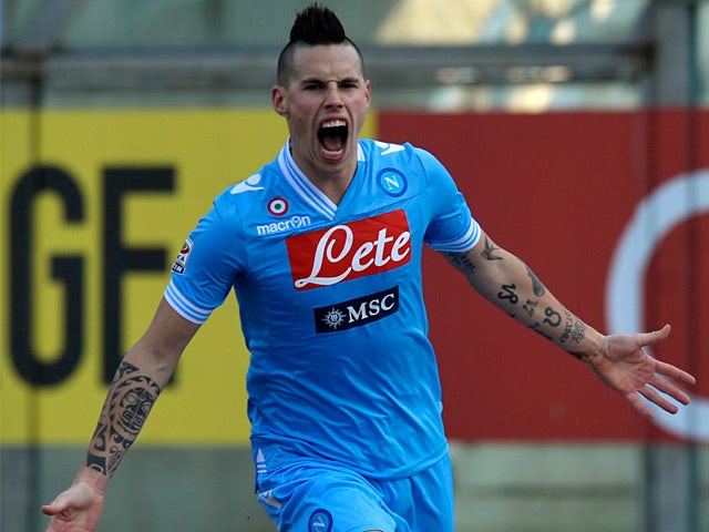 Napoli seal second with Bologna romp