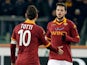 Roma's Mattia Destro is congratulated by team mate Francesco Totti after scoring his team's second against Inter on January 23, 2013