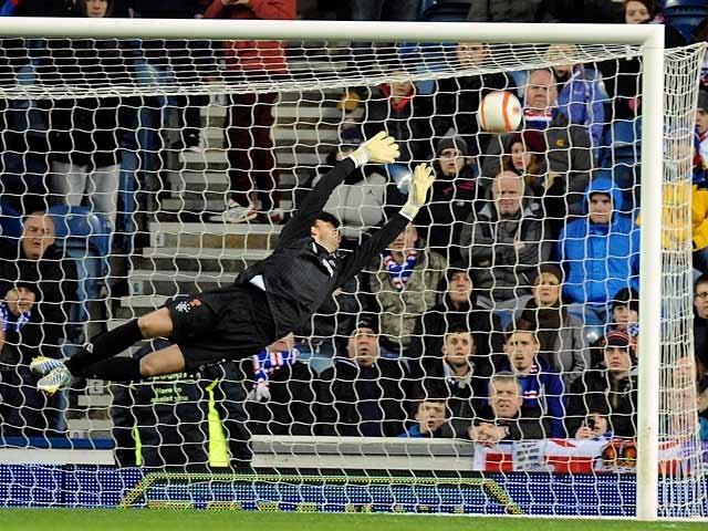Rangers' keeper Neil Alexander fails to stop Montrose David Gray's long-range strikes to equalise in their league match on January 26, 2013