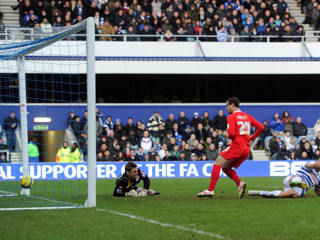 MK Dons player Ryan Harley scores the third goal during his sides FA Cup fourth round tie with QPR on January 26, 2013