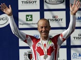Canadian Svein Tuft celebrates his silver medal in the Men's Time Trial event, at the road World cycling Championships on September 25, 2008 
