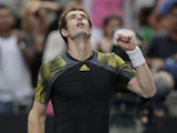 Britain's Andy Murray celebrates after defeating Gilles Simon in the fourth round of the Australian Open tennis championship on January 21, 2013