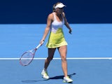 Caroline Wozniacki argues over a line call with the chair umpire during her fourth round clash at the Australian Open tennis championship on January 21, 2013