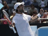 France's Jeremy Chardy celebrates winning hiss fourth round match against Andreas Seppi at the Australian Open tennis championship on January 21, 2013
