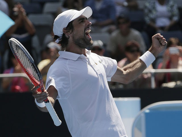 France's Jeremy Chardy celebrates winning hiss fourth round match against Andreas Seppi at the Australian Open tennis championship on January 21, 2013