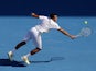 Frenchman Jo-Wilfried Tsonga stretches for a return shot during his fourth round match with Richard Gasquet at the Australian Open tennis championship on January 21, 2013