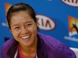 China's Li Na smiles during a press conference ahead of the final of the Australian Open tennis championship on January 25, 2013