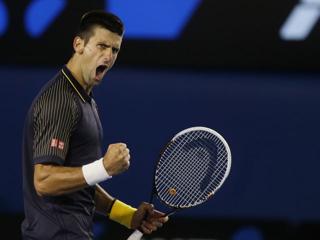 Serbia's Novak Djokovic celebrates winning the second set of the men's final at the Australian Open tennis championship on January 27, 2013