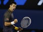 Serbia's Novak Djokovic celebrates winning the second set of the men's final at the Australian Open tennis championship on January 27, 2013