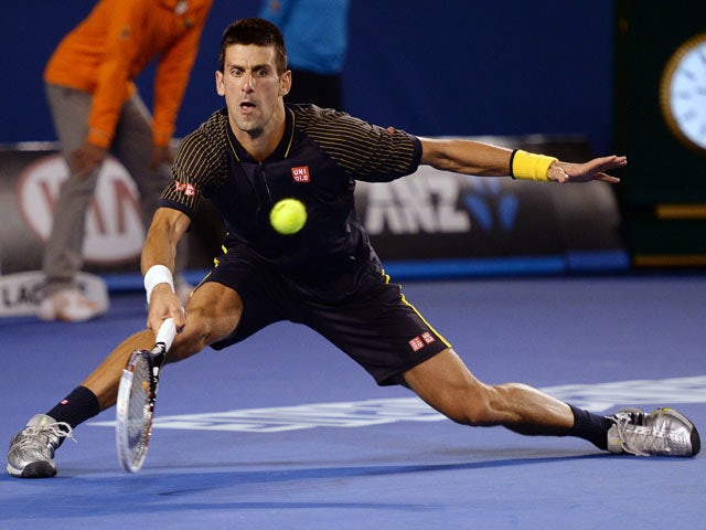 Serbia's Novak Djokovic in action against Andy Murray during their men's final at the Australian Open tennis championship on January 27, 2013