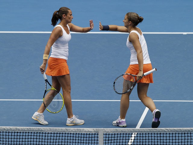 Italians Sara Errani (right) and Roberta Vinci (left) during the their women's doubles final in the Australian Open tennis championship on January 25, 2013