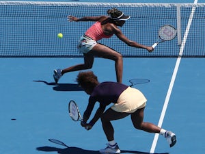 The Williams sisters in action at the Australian Open tennis championship on January 22, 2013