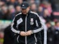 Stoke City manager Tony Pulis looks at the ground moments after the final whistle as his team loses to Manchester City in the FA Cup fourth round on January 26, 2013