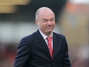 Brentford manager Uwe Rosler pulls a face after the final whistle as his team draw with Chelsea in their FA Cup fourth round match on Janaury 27, 2013