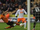 Blackpool player Thomas Ince scores for his side in their Championship match with Wolverhampton Wanderers on January 26, 2013