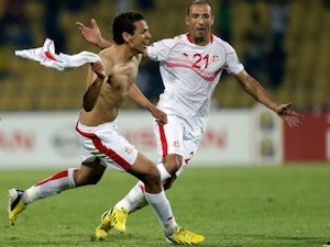 Tunisia record late win