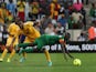 Zambia's Chisamba Lungu is challenged by Ethiopia's Adane Girma during their teams match at the African Cup of Nations on January 21, 2013
