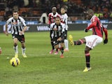 New AC Milan signing Mario Balotelli scores a penalty in the last minute of his side's game with Udinese on February 3, 2013