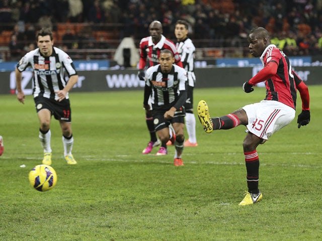 New AC Milan signing Mario Balotelli scores a penalty in the last minute of his side's game with Udinese on February 3, 2013