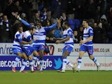 Reading's Adam Le Fondre celebrates with teammates after a stoppage time equaliser against Chelsea on January 30, 2013
