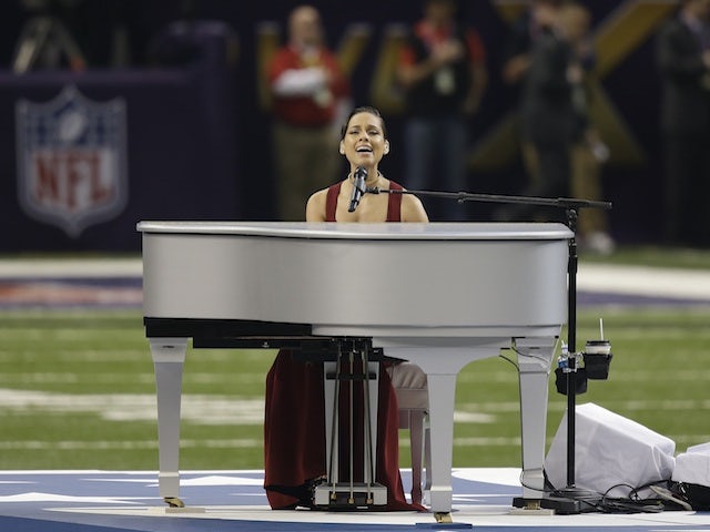 Alicia Keys sings the national anthem before the Superbowl on February 3, 2013