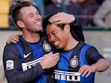 Inter's Antonio Cassano is congratulated by team mate Yuto Nagatomo after scoring the equaliser against Siena on Febraury 3, 2013