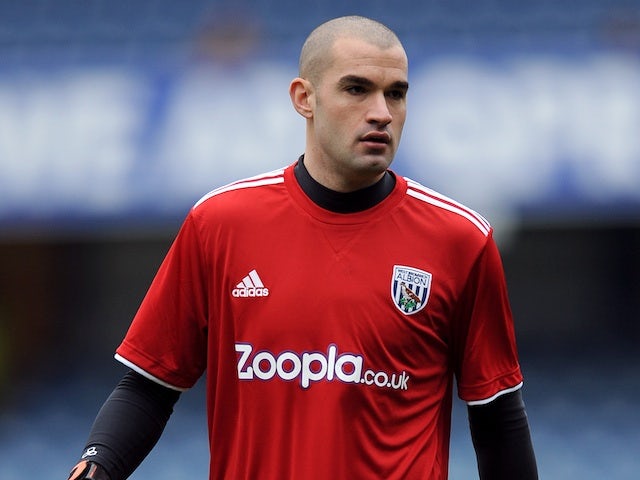 Baggies goalie Boaz Myhill warming up before the game with QPR on January 5, 2013