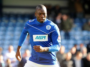 New QPR signing Christopher Samba prior to kick off in his side's match with Norwich on February 2, 2013