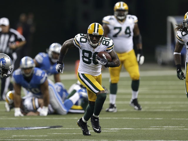 Green Bay Packers wide receiver Donald Driver runs with the ball during his team's match against the Detroit Lions on November 18, 2012