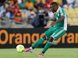 Nigeria's Emmanuel Emenike takes a free kick to score the opening goal of the match against Ivory Coast on February 3, 2013