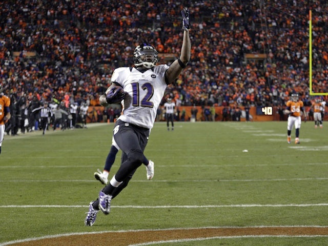 Ravens WR Jacoby Jones celebrates a touchdown against Denver on January 12, 2013