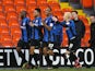 Barnsley's Jason Scotland is congratulated by teammates after a goal against Blackpool on February 2, 2013