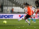Lorient forward Jeremie Aliadiere scores a penalty in his team's game with Marseille on December 9, 2012