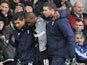Jermain Defoe is helped by his team's physio's after picking up an ankle inury during the match against West Brom on February 3, 2013