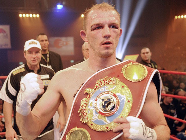 German Juergen Braehmer celebrates after winning the WBO World Championship Light Heavyweight title on December 18, 2009
